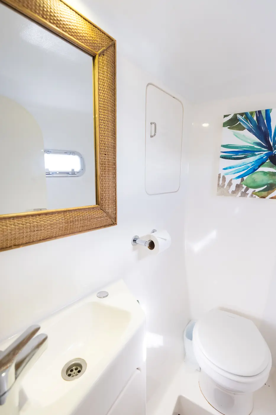 Bathroom with gold mirror