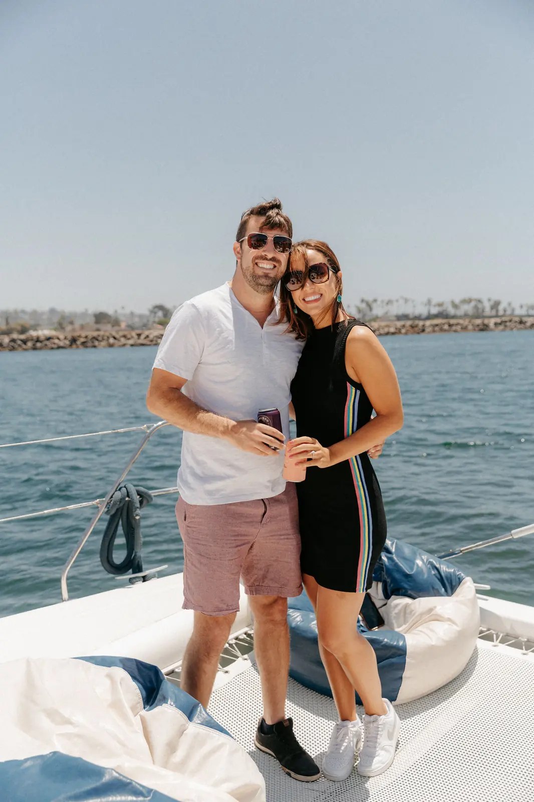 Couple on bow with downtown skyline