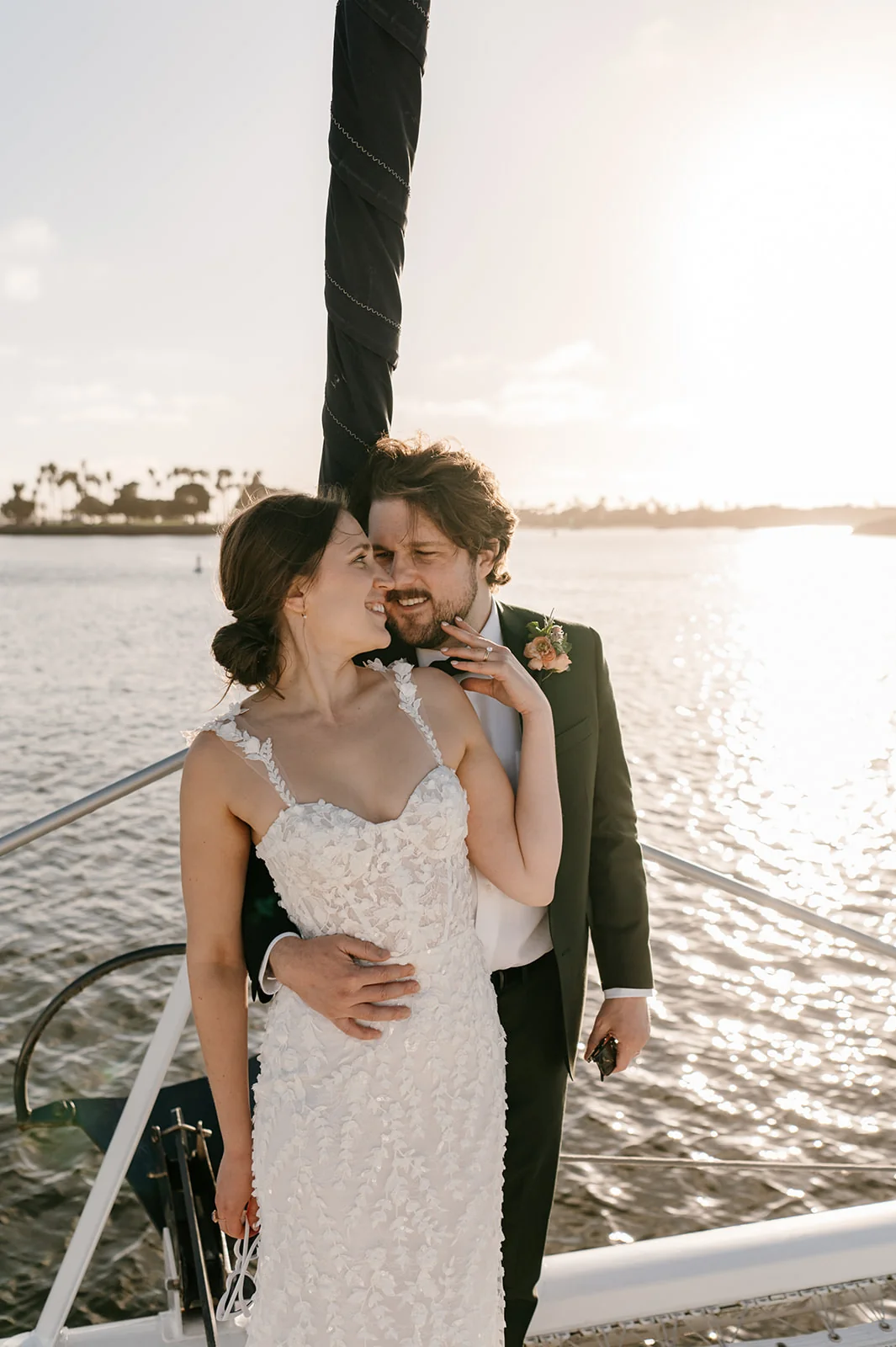 Wedding bow embrace sunset