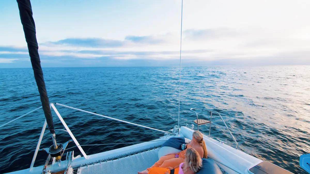 Golden hour colors over San Diego Bay from Malarky's private sunset charter